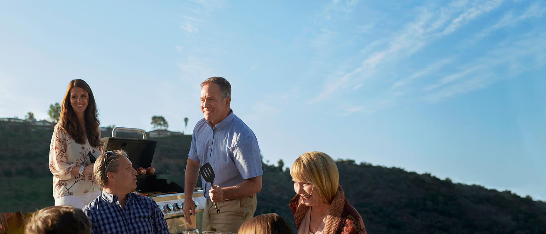 Beltone Amaze user ejoying barbeque