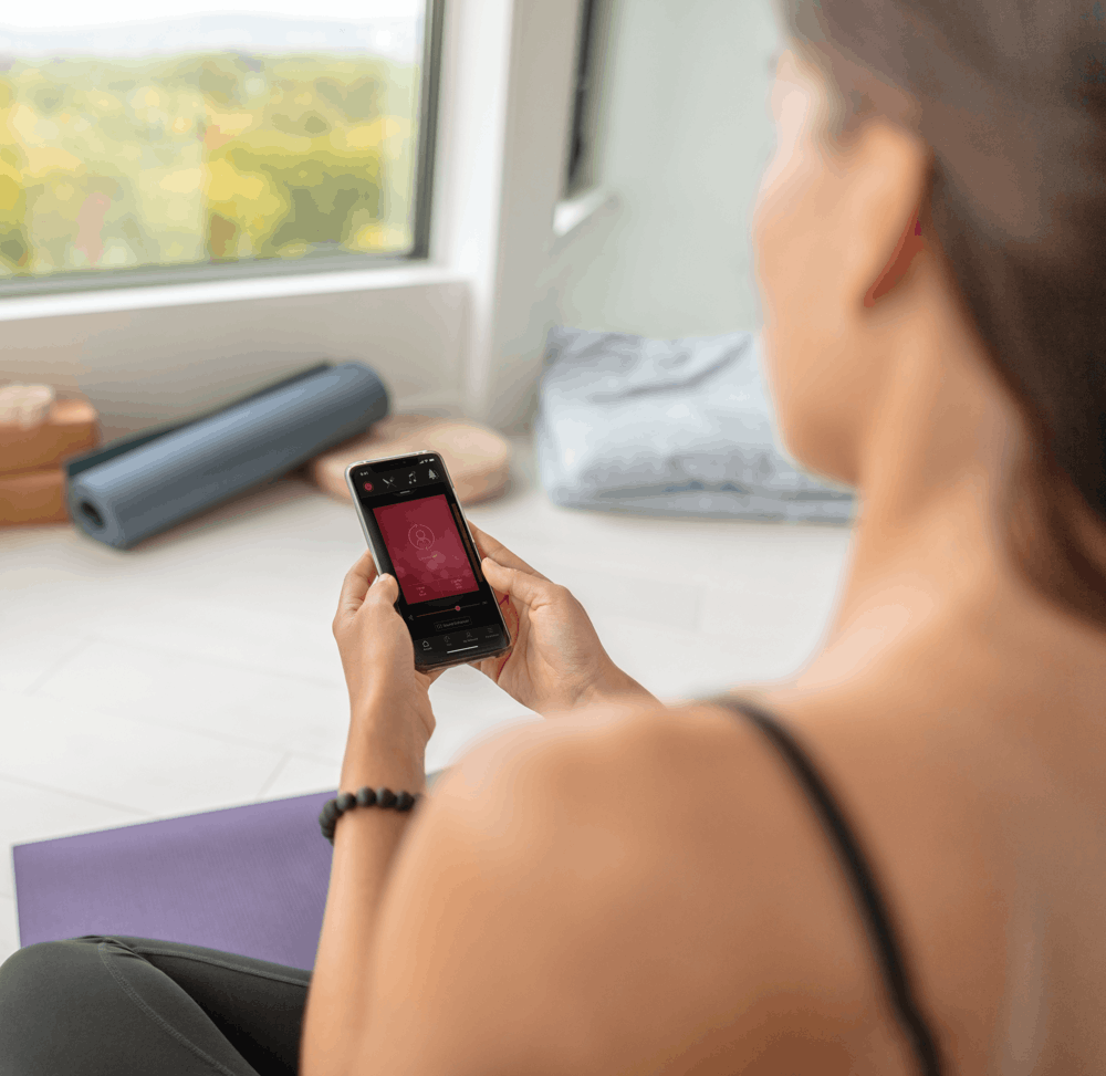 Femme avec appli ReSound