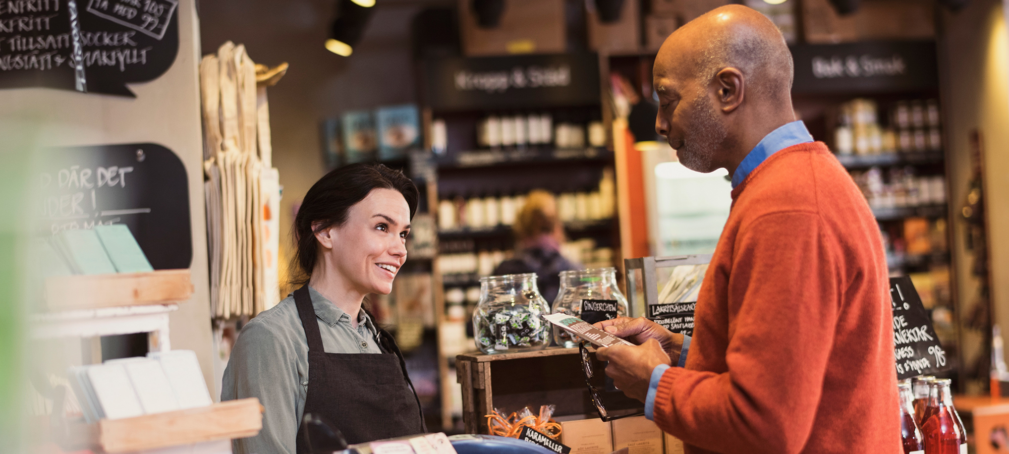 Chef wearing ReSound hearing aids at work.
